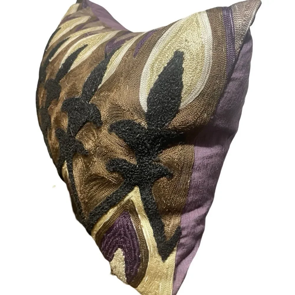 Ornate Brown and Black Accent Pillow with Symmetrical Motifs